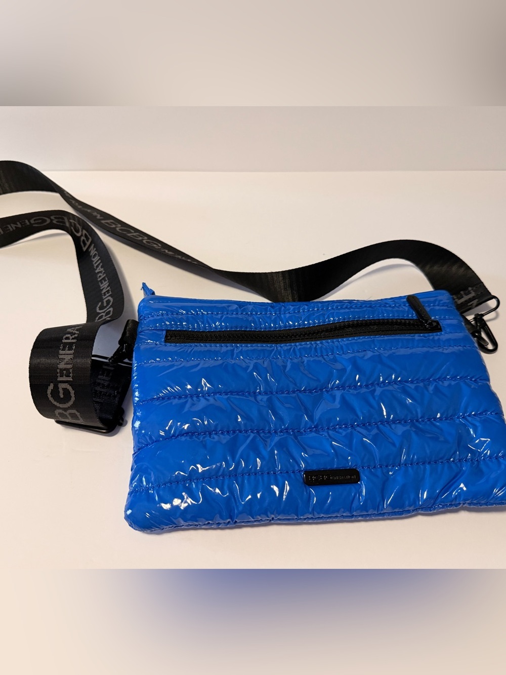 BCBGeneration Shiny Blue Quilted Belt Bag with Black Branded Strap